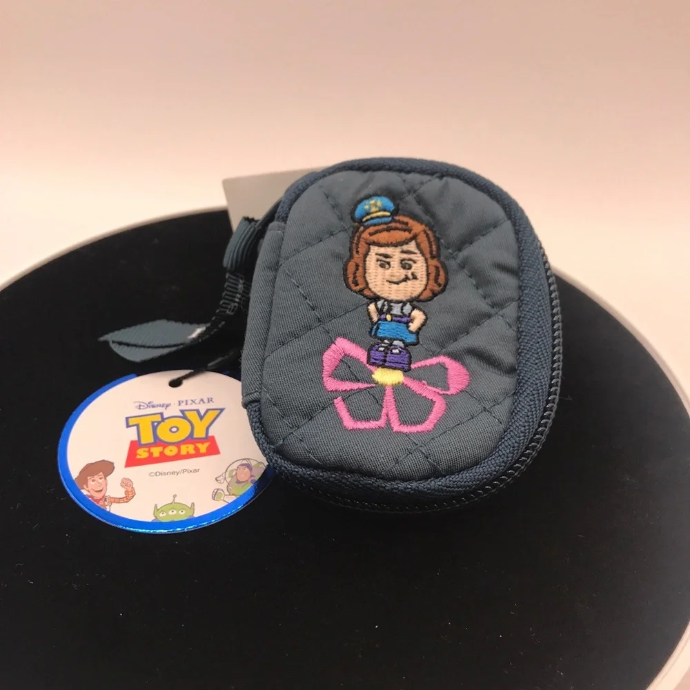 SOLD……..NWT Vera Bradley Disney Pixar Toy Story Andy’s Room Bag Charm - Picture 8 of 8